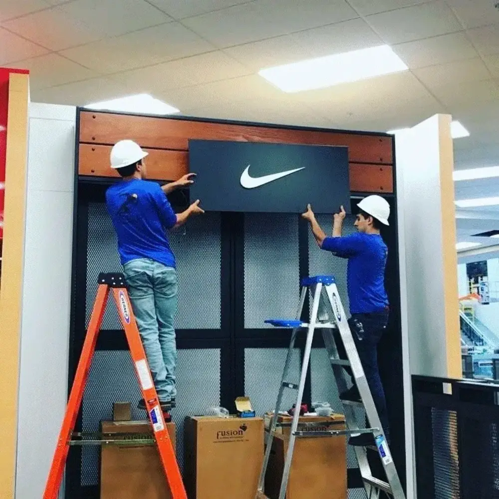 Retail signage installation for Nike store by Action Services & Programs